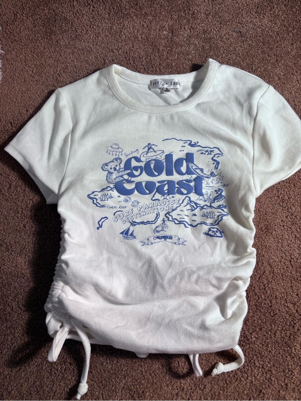 Fitz + Eddy White "Gold Coast" Graphic Ruched Crop Tee